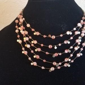 Pink and gold tone necklace